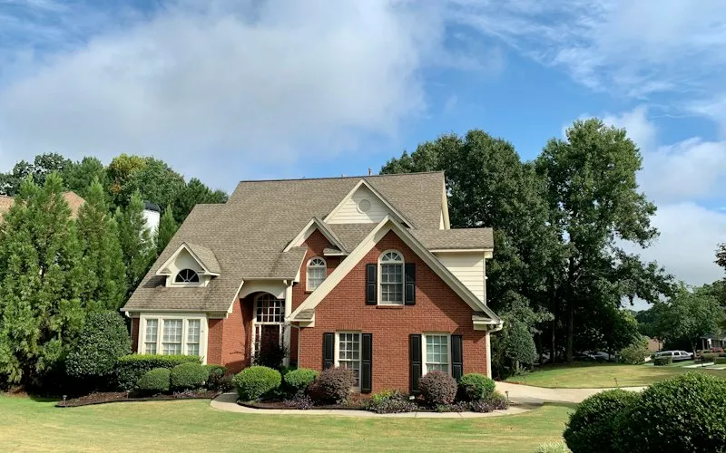 Large brick family home (illustrative photo for 4+ bedroom houses in Waterloo)