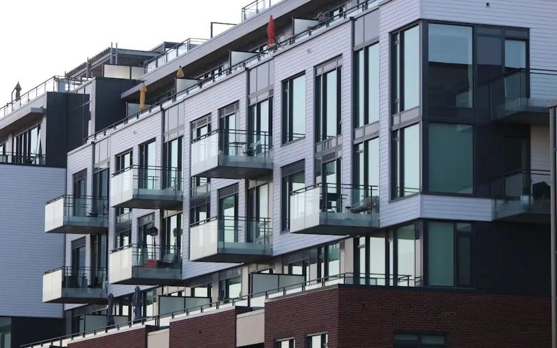 Modern condo building with balconies (illustrative photo for Condos across the region)